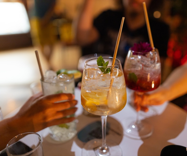 A group of people enjoying some cocktails at Winston House
