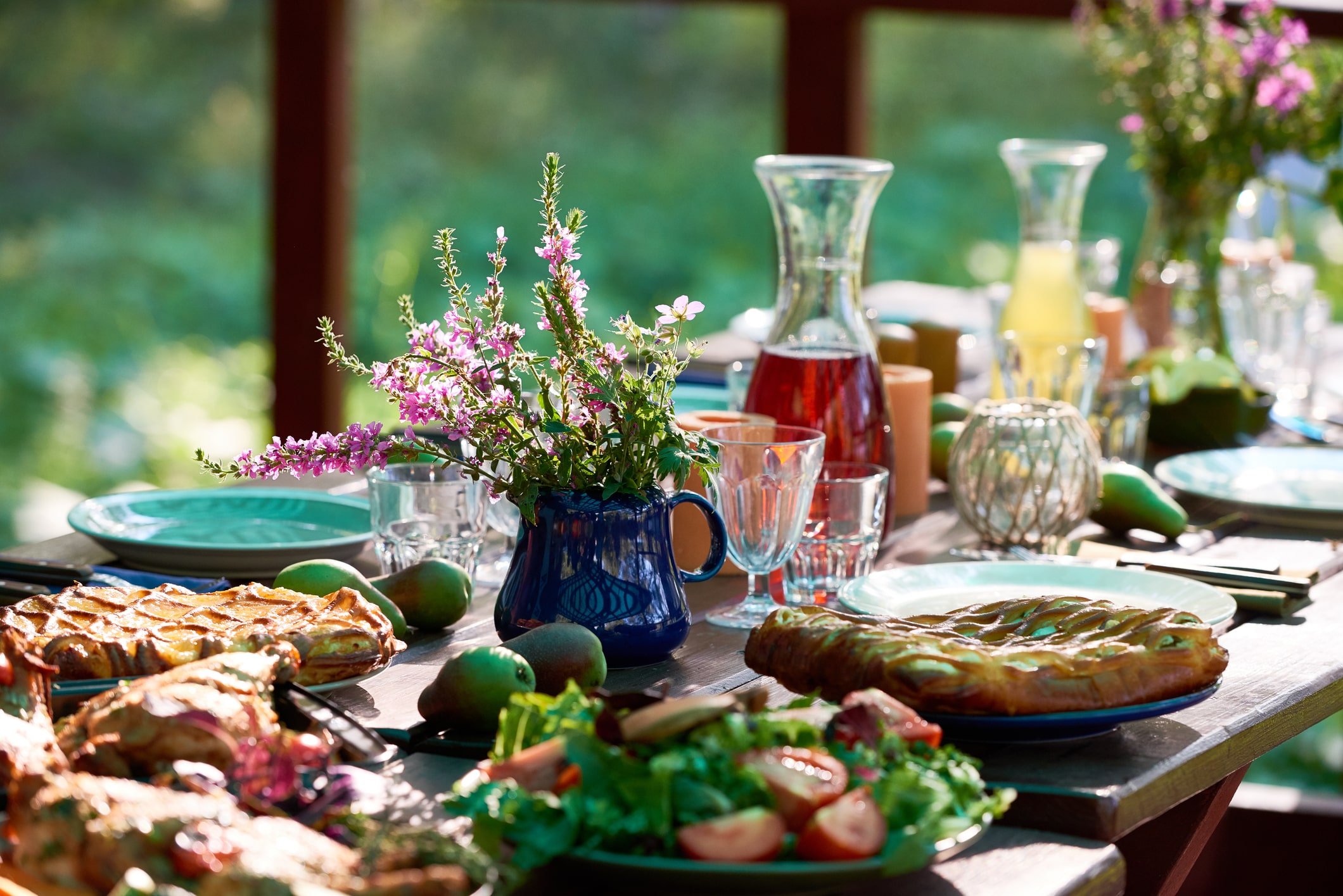 Tables lined with food and drinks ready for guests to enjoy at Ivy at the Shore
