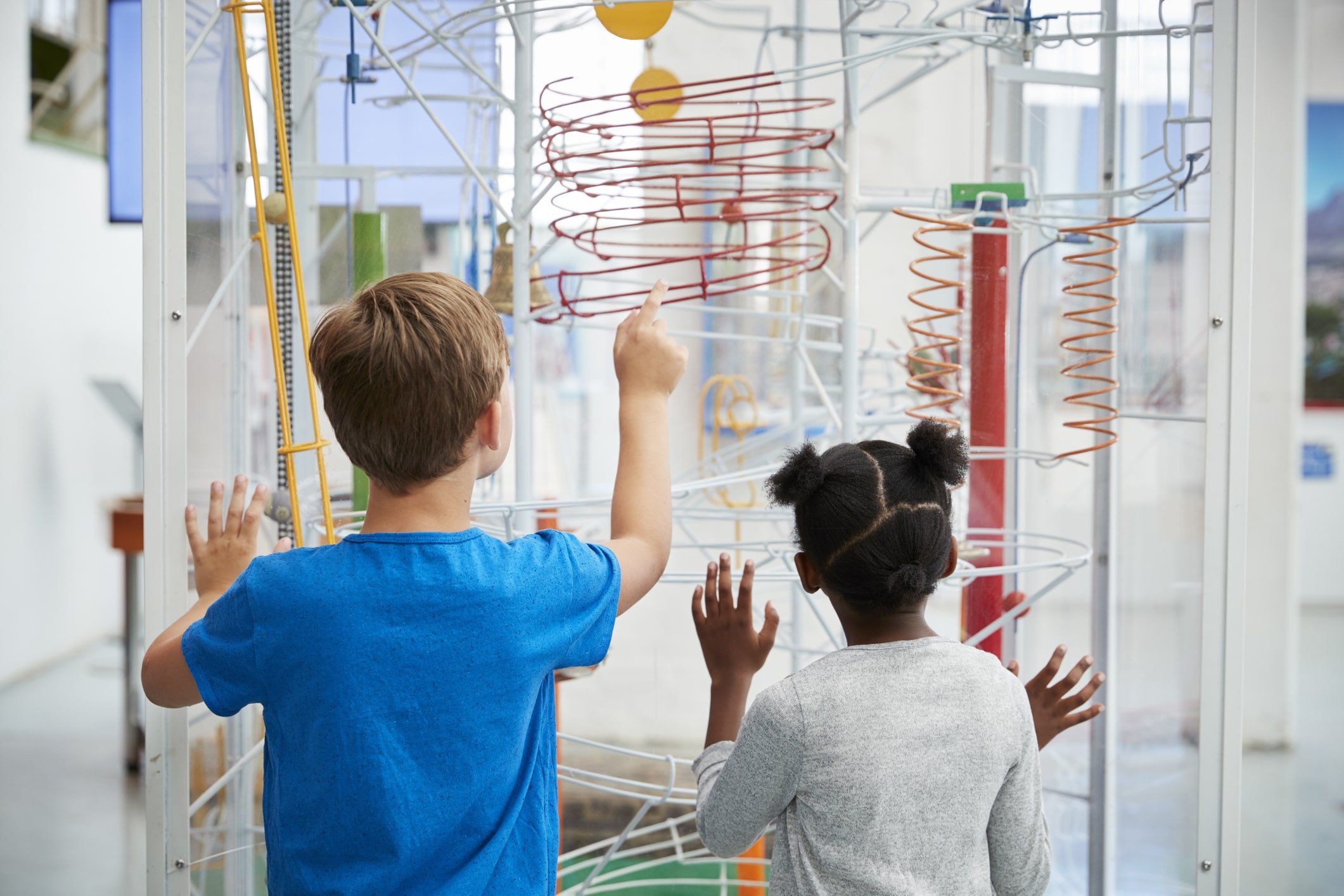 two children looking at a science exhibit at the Cayton's Children's Museum