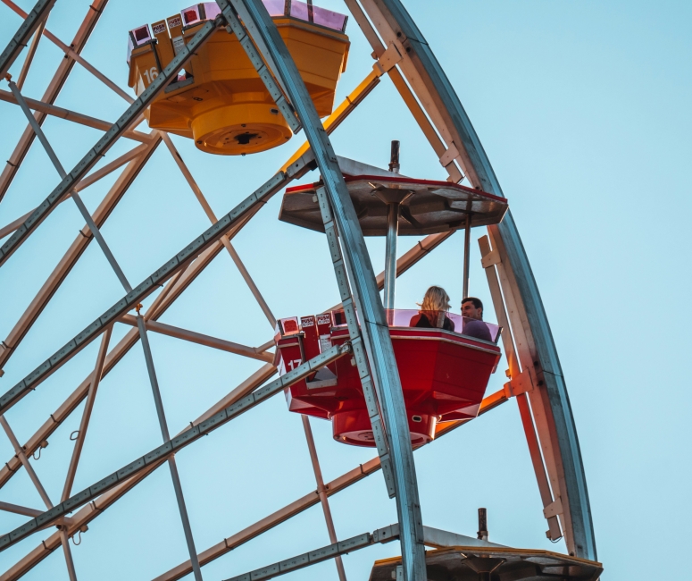Two people enjoying a ferris wheel ride at Sandbourne Santa Monica