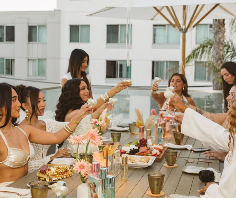 Woman toasting at a gathering
