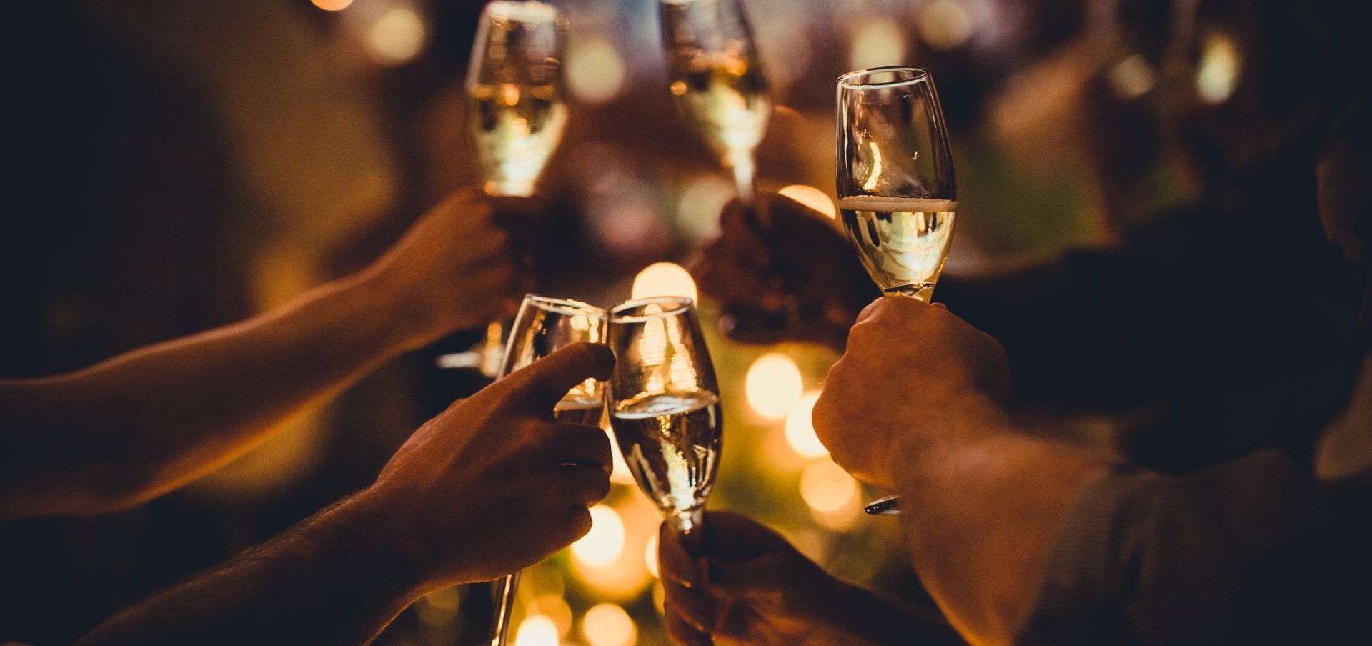 Groups of people enjoying glasses of champagne at Sandbourne Santa Monica