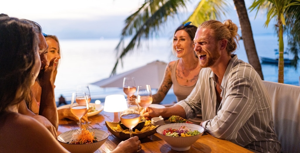 Group of people enjoying dinner