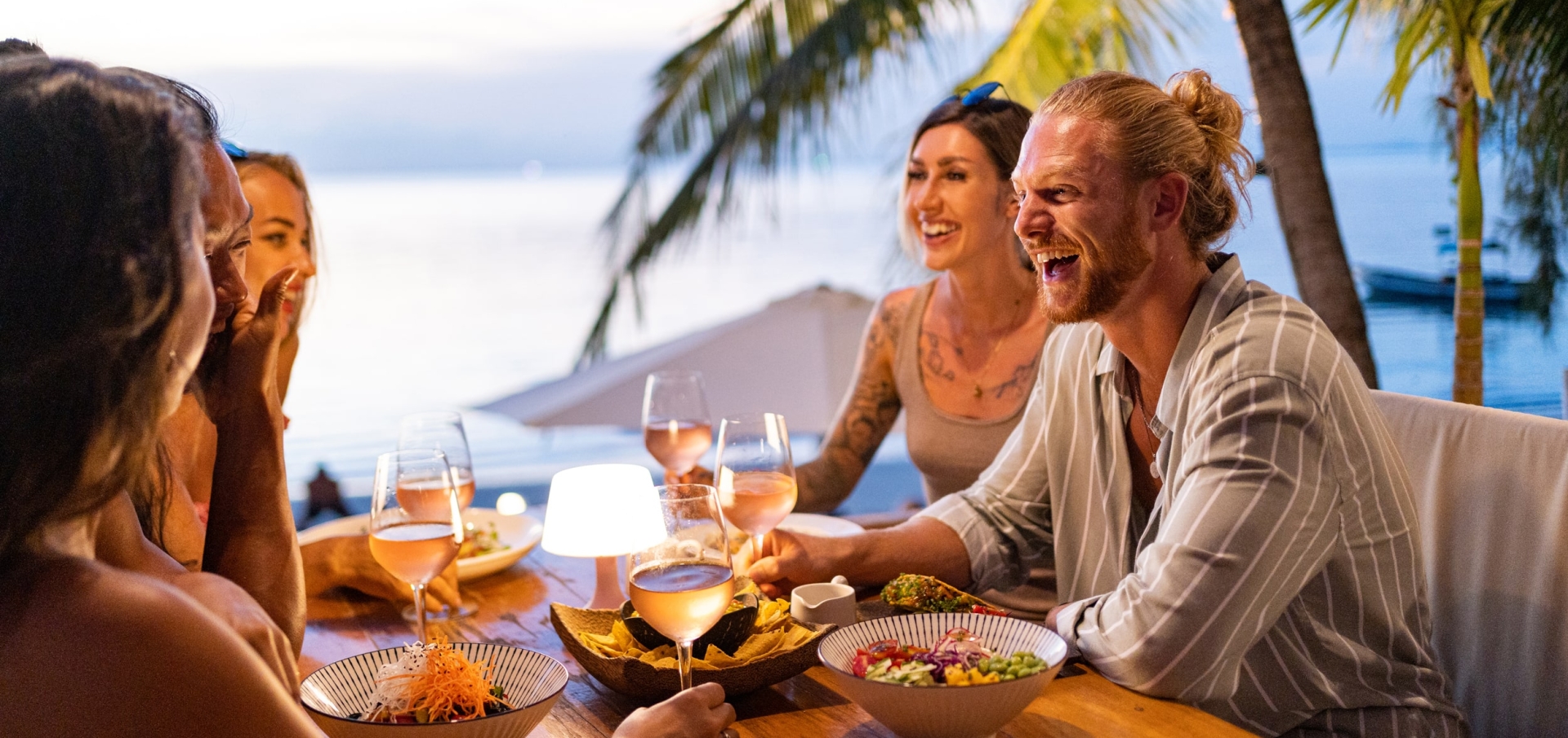 Group of people enjoying dinner