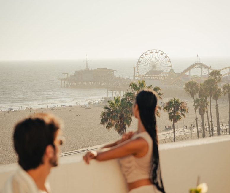 couple overlooking santa monica beach